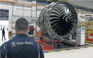  ?? /Reuters ?? Speeding up: Trent XWB engines, designed for Airbus A350 aircraft, on the assembly line at the Rolls-Royce factory in Derby. The group plans to almost double its output of such engines.