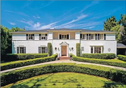  ?? Coldwell Banker Residentia­l Brokerage ?? THE WESTSIDE estate once shared by Jane Wyman and Ronald Reagan is listed at $7 million.