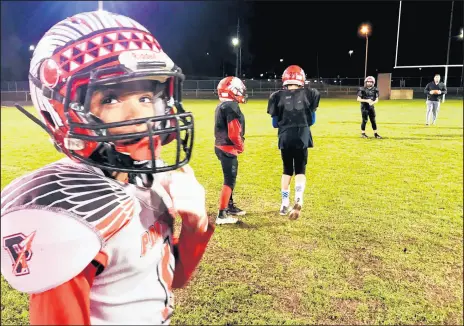  ?? JERRY DAVICH/POST-TRIBUNE PHOTOS ?? Lashon Tolbert is one member of the unbeaten Portage Pop Warner Pee Wee football team that’s headed to the national finals in Orlando, Florida.