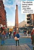  ?? REBUILDING MANCHESTER ?? The obelisk being taken down in July 1997