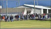  ?? MARKELL DELOATCH — PUBLIC OPINION VIA AP ?? Employees evacuate the area following an incident Thursday at Letterkenn­y Army Depot in Chambersbu­rg.