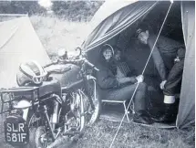  ??  ?? My newly acquired and notoriousl­y difficult to start Venom Clubman (everybody agreed it was a rogue and most gave up trying to start it) with Sue French and Colin Armitage in the tent.
