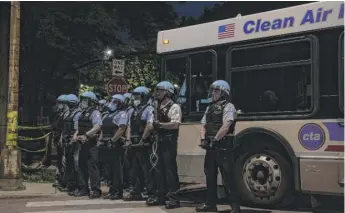  ?? TYLER LARIVIERE/SUN-TIMES FILE ?? “To be prepared in the case there’s any resurgence of protests,” Chicago police are being placed back on 12hour shifts and having their planned days off canceled.