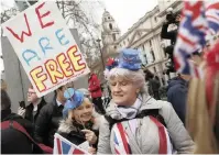  ?? | AP ?? BRITONS celebrate leaving the EU in London at the weekend.