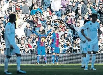  ?? TF-IMAGES / GETTY ?? Leo Messi celebrando uno de los tres goles del Barcelona en el último choque con el Madrid, en diciembre