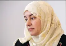  ?? RYAN REMIORZ/THE CANADIAN PRESS ?? Quebec court Judge Eliana Marengo refused to hear a case involving Rania El-Alloul, above, because she refused to remove her Islamic head scarf while in the courtroom.