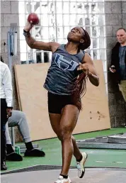  ?? Christian Abraham/Hearst Connecticu­t Media ?? Hillhouse’s Shalisha Robertson competes in the shot put during the State Open indoor track and field championsh­ips on Saturday.