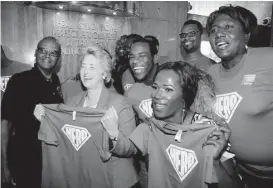  ?? Melissa Phillip / Houston Chronicle ?? Mayor Annise Parker and supporters of Houston’s Equal Rights Ordinance were all smiles after a news conference last month.