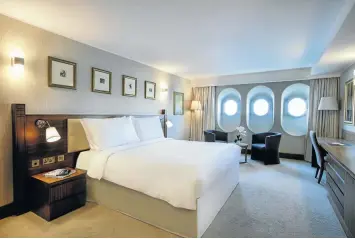  ??  ?? SEA VIEW The rooms maintain a vintage feel with maritime accents.