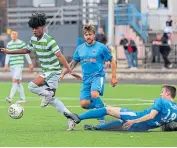  ??  ?? Celtic B’s Benny-jackson Luyeye in action against Bo’ness United at Newtown Park