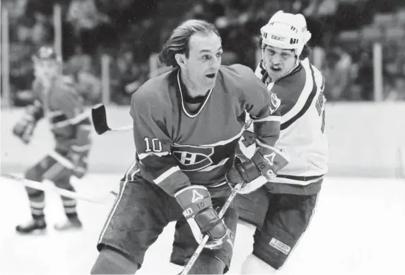  ?? Ap FILe ?? ‘TERRIFIC HOCKEY PLAYER’: Montreal’s Guy Lafleur cuts in front of New Jersey’s Aaron Broten on Dec. 20, 1983. Lafleur died Friday at the age of 70.