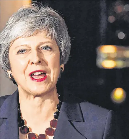  ??  ?? Brave face: Britain’s Prime Minister Theresa May gives a statement outside 10 Downing Street in London last night.