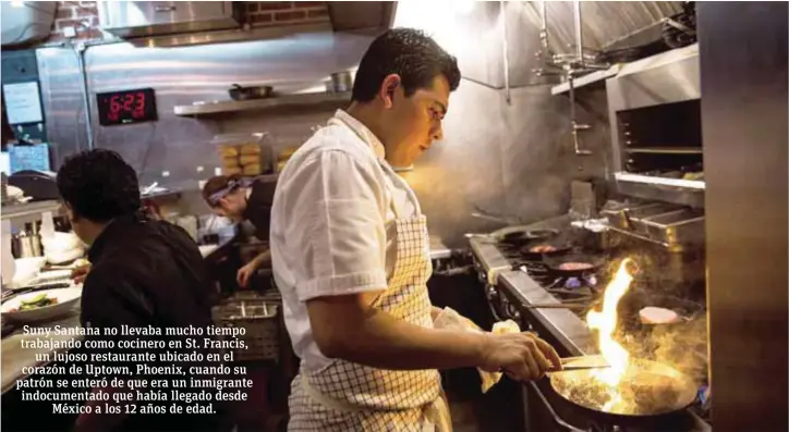  ?? |THE NEW YORK TIMES ?? Suny Santana cocina un filete en la cocina del restaurant­e St. Francis.