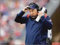  ?? Michael Dwyer / Associated Press ?? Patriots head coach Bill Belichick looks on during the first half against the Dolphins.