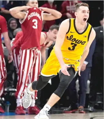  ?? DARRON CUMMINGS/AP ?? Iowa’s Jordan Bohannon celebrates after making the winning shot Saturday against Indiana.