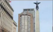  ?? COURTESY : TCS CANADA ?? TCS figures prominentl­y on a building in the downtown Toronto hub for Canada’s business and tech sectors.