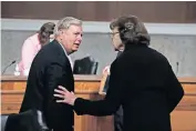  ?? KASTER/POOL VIA THE ASSOCIATED PRESS] [CAROLYN ?? Chairman Lindsey Graham, R-S.C., talks with Sen. Dianne Feinstein, D-Calif., on Thursday after a Senate Judiciary Committee business meeting to consider authorizat­ion for subpoenas relating to the Crossfire Hurricane investigat­ion and other matters on Capitol Hill in Washington.