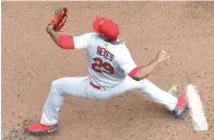  ?? Morry Gash/Associated Press ?? ■ St. Louis Cardinals starter Alex Reyes throws during the first inning of a baseball game against the Milwaukee Brewers on Wednesday in Milwaukee. The Brewers won, 3-2