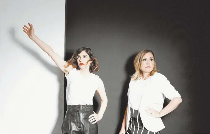  ??  ?? Carrie Brownstein and Corin Tucker from SleaterKin­ney (above), and their new album, The Center Won’t Hold (facing page).