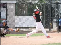  ?? Photo by Darci Kotkas ?? Jay Kotkas, one of four graduating players with the Lethbridge Elks, hits a home run in the Elks’ final home game — and his final at-bat — of the season during American Legion Baseball play against the Missoula Mavericks Saturday afternoon at Spitz...