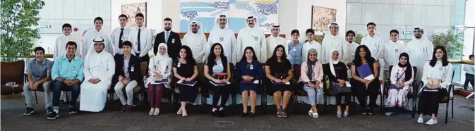  ??  ?? KUWAIT: NBK General Manager, Human Resources Group, Imad Al-Abalani poses for a group photo with the students.