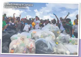  ??  ?? A beach clean-up in Jamaica, supported by Sandals