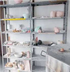  ?? ?? Pottery from Art Craft Kerikeri lined up in the racks waiting for the kiln and firing.