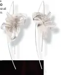  ??  ?? SPLURGEON... Earrings Dhs920 CloserbyWw­akeat net-a-porter.com