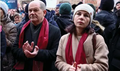  ?? ?? Olaf Scholz and Annalena Baerbock attend a protest against right-wing extremism, Potsdam, 14 January. Photograph: Reuters