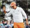  ?? CONTRIBUTE­D BY JASON GETZ ?? Rickie Fowler acknowledg­es the crowd after his putt on No. 18 Sunday finished off a final round 67.