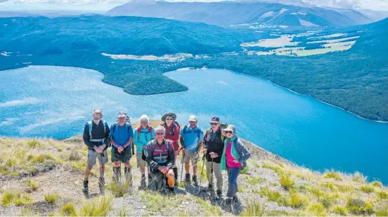  ?? ?? On Mt Roberts overlookin­g Lake Rotoiti. Everyone in the photo is in their 80s.