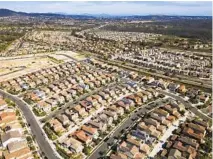  ?? K.C. ALFRED U-T ?? San Diego home prices jumped in January, as they did across the nation, according to the S&P CoreLogic report. The city has had the third-highest increase, behind Phoenix and Seattle.