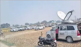  ??  ?? District administra­tion officials and media personnel camping at Jayapur village in Varanasi on Thursday. The village has been adopted by Prime Minister Narendra Modi.