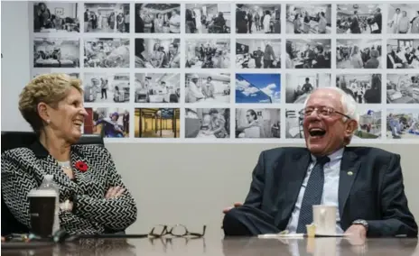  ?? CHRISTOPHE­R KATSAROV/THE CANADIAN PRESS ?? U.S. Sen. Bernie Sanders and Premier Kathleen Wynne share a laugh during a visit to Mount Sinai Hospital’s state-of-the-art neonatal intensive care unit.