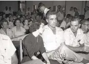  ?? AP FILE ?? Carolyn Bryant rests her head on her husband’s shoulder after she testified in court in 1955.