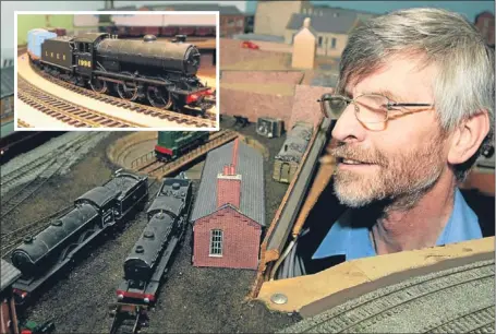  ?? Pictures: John Stevenson. ?? Ken Morris with his model railway layout, model buildings, below, and one of the engines, inset.