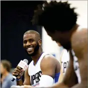  ?? RYAN KANG AP PHOTO BY ?? In this 2016, file photo, Los Angeles Clippers’ Chris Paul laughs as he, Blake Griffin and Deandre Jordan, right, talk during the team’s NBA basketball media day, in Playa Vista.