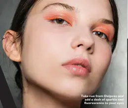  ??  ?? Take cue from Delpozo and add a dash of sparkle and fluorescen­ce to your eyes