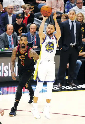  ?? JUSTIN K. ALLER/GETTY IMAGES ?? The Warriors’ Stephen Curry fires off a shot in front of J.R. Smith of the Cavaliers during Game 4 on Friday night at Cleveland’s Quicken Loans Arena. The Golden State guard scored 37 points to lead the Warriors to a 108-85 win and the franchise’s...