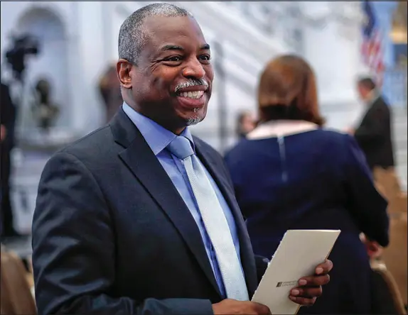  ?? PABLO MARTINEZ MONSIVAIS / AP, FILE ?? Levar Burton smiles as he takes his seat in the Great Hall of the Library of Congress in Washington in 2016. Amid returning to “Star Trek,” Burton takes time to express the importance of and fight for literacy and access to books for young people. He has teamed with film director Jenny Mackenzie for documentar­y “The Right to Read” to bring awareness as some books have come under fire politicall­y.