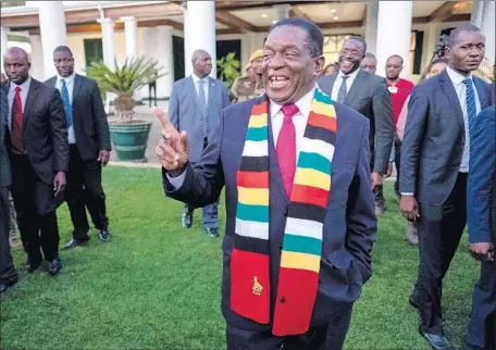  ?? Marco Longari AFP/Getty Images ?? PRESIDENT Emmerson Mnangagwa of Zimbabwe said he “won the election freely and fairly,” but his rival vowed to challenge the results.