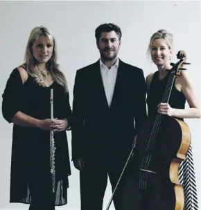  ??  ?? Euan Stevenson with cellist Betsy Taylor and flautist Katherine Bryan