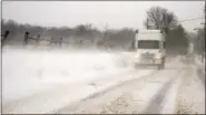  ?? GENE WALSH — DIGITAL FIRST MEDIA ?? High winds blow snow on to Route 113 in Trappe Thursday.