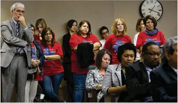  ?? DEBORAH CANNON / AMERICAN-STATESMAN ?? Onlookers, including Alief Superinten­dent H.D. Chambers (left), watch as testimony begins on HB 22 at the House Committee on Public Education at the Capitol on Tuesday. HB 22 would scale back the A-F accountabi­lity system that has been criticized since its proposal in 2015.