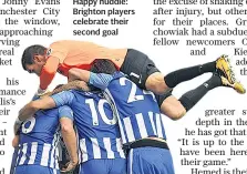  ??  ?? Happy huddle: Brighton players celebrate their second goal