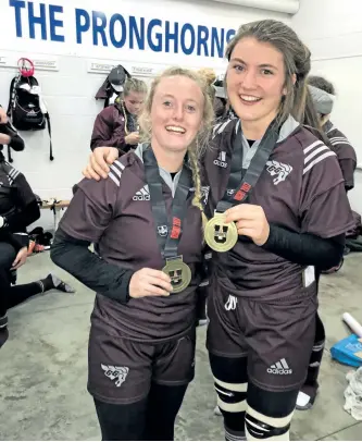  ?? SUBMITTED PHOTO ?? Georgia Stewart (right) and her Ottawa Gee Gees teammate Kelsey Welsh celebrate their U Sports women's rugby championsh­ip on Nov. 5 following a 20-10 win over Laval in Lethbridge, Alta.