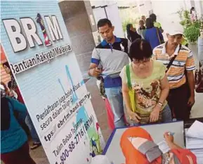  ??  ?? Usaha tangani kos sara hidup rakyat, ternyata capai matlamat 100 peratus KPI secara konsisten menerusi pemberian BR1M.