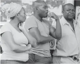  ??  ?? Mr Jeremiah Chapeyema (right) with family members