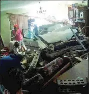  ??  ?? WRECKED: A vehicle crashed into the lounge of a Eastridge, Mitchells Plain, home.
