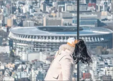  ?? GETTY IMAGES ?? Tokyo’s new National Stadium will have to wait for another year before the Olympics, postponed on Tuesday, bring it to life.